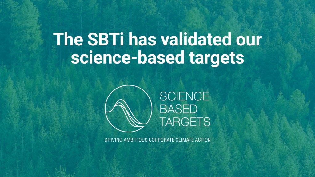 The text "The SBTi has validated our science-based targets" and the Science Based Targets logo placed over a background image of a lush forest